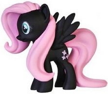 Fluttershy figure, produced by Funko. Front view.