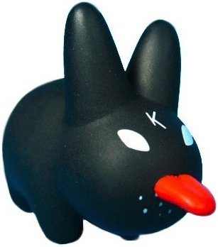 Black with Tongue  figure by Frank Kozik, produced by Kidrobot. Front view.