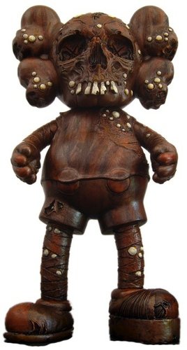 Kaws x Pushead Companion - Bronze figure by Kaws X Pushead, produced by Medicom Toy. Front view.