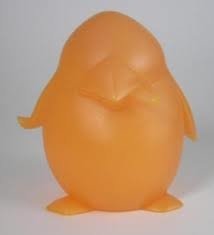 Harold the Penguin - Orange figure by Frank Kozik, produced by Toytokyo. Front view.