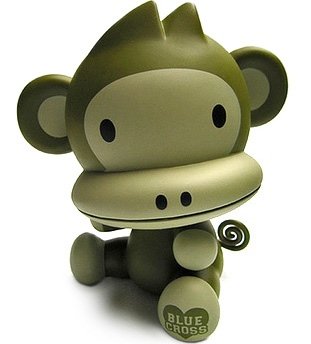 Green Monkey Baby Qee (Blue Cross) figure, produced by Toy2R. Front view.