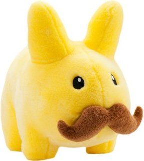 Stache Labbit 14 - Yellow figure by Frank Kozik, produced by Kidrobot. Front view.
