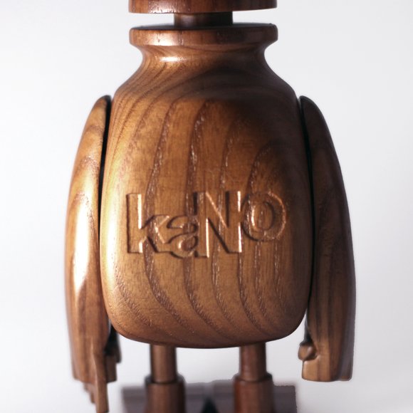 Wooden Bodega figure by Kano, produced by Knocks On Wood. Detail view.