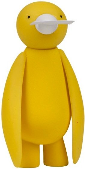 Yellow Ji Ja Bird figure by Mr. Clement. Front view.